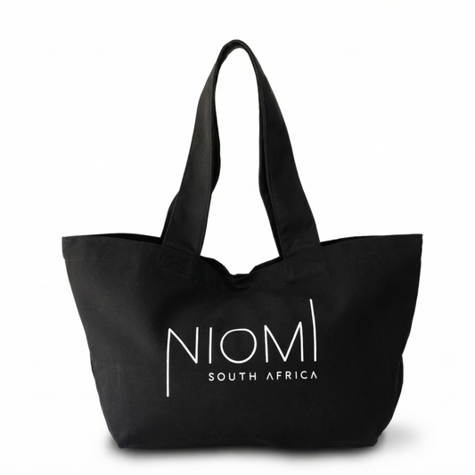 NIOMI large black tote bag with white NIOMI logo, stylish everyday carry bag for beach, gym, and shopping