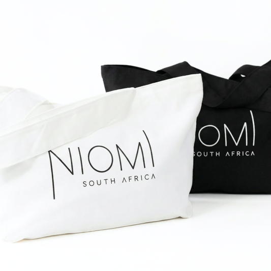 NIOMI large black and white tote bag both with  NIOMI logo, stylish everyday carry bag for beach, gym, and shopping