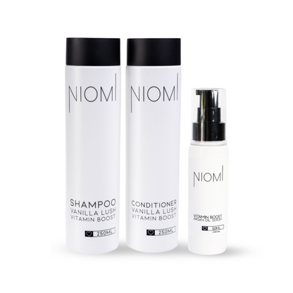 Three NIOMI hair care products on a white background