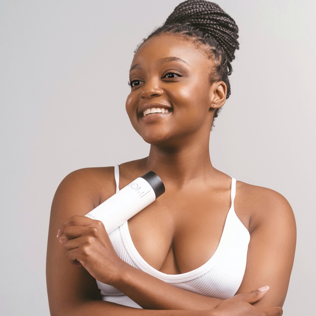 NIOMI Vanilla Lush Vitamin Boost Shampoo with Model